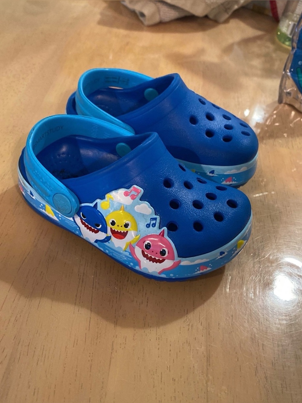 CROCS Kids Blue Shark Print Clogs with Multicolor Accents